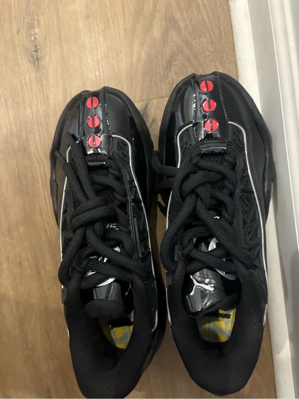 Puma Black Athletic Sneakers with Red and Yellow Accents - Picture 2 of 4